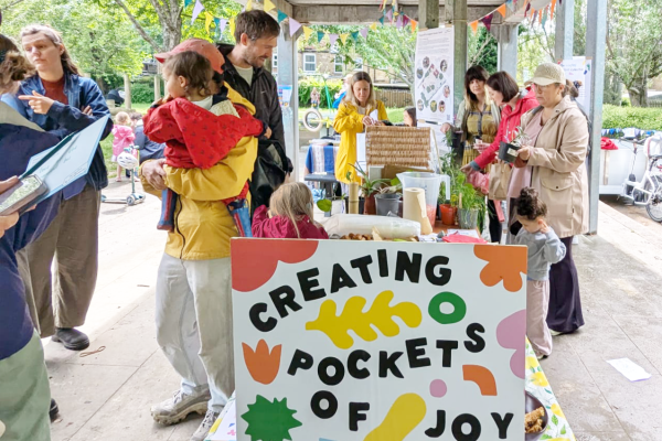 LMC Summer Gathering - a table, bunting, colour, people, families